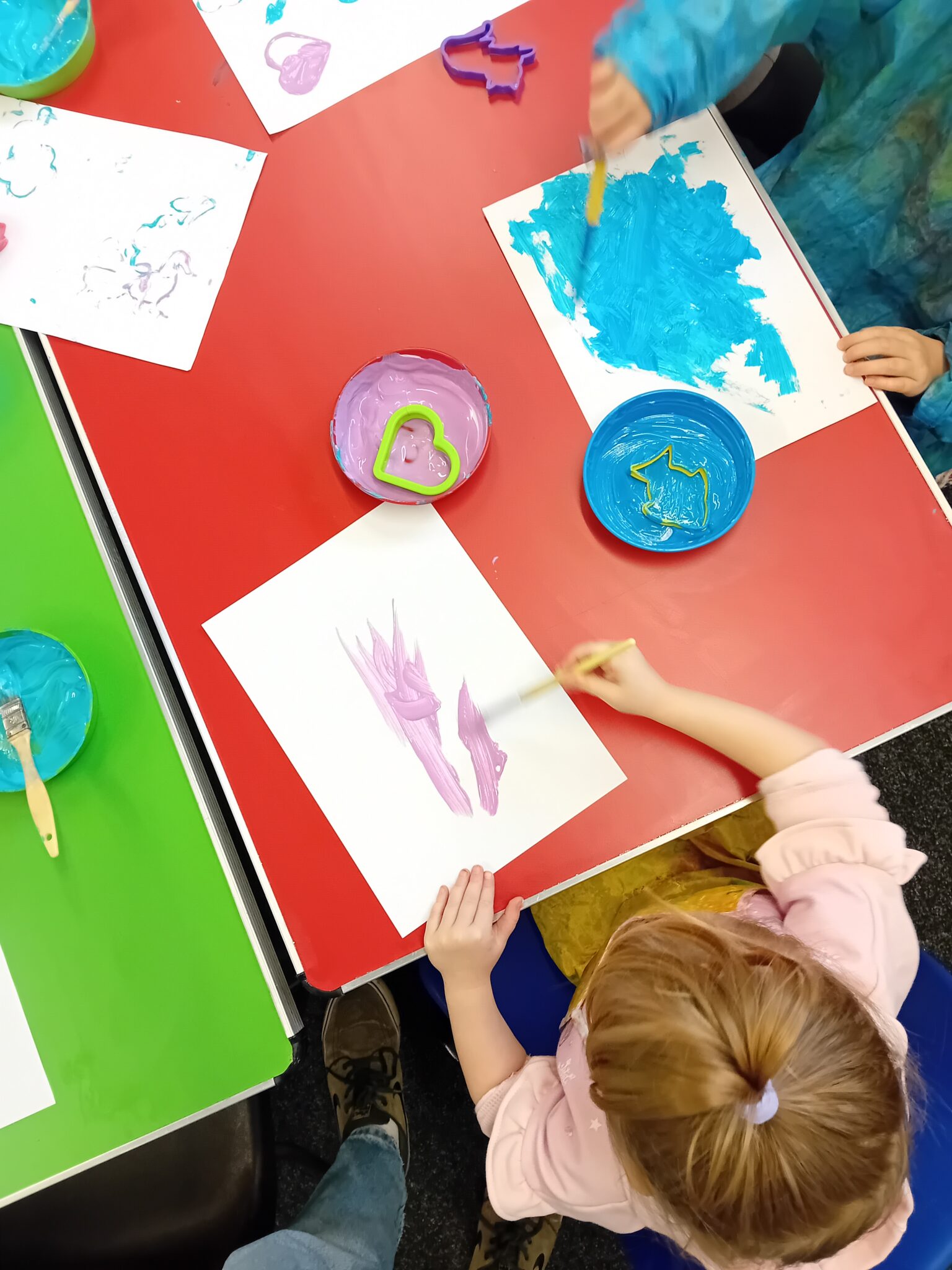 Young children painting